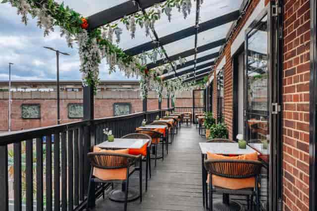 Charming outdoor terrace at The Mezzanine, ideal for networking events and gatherings.