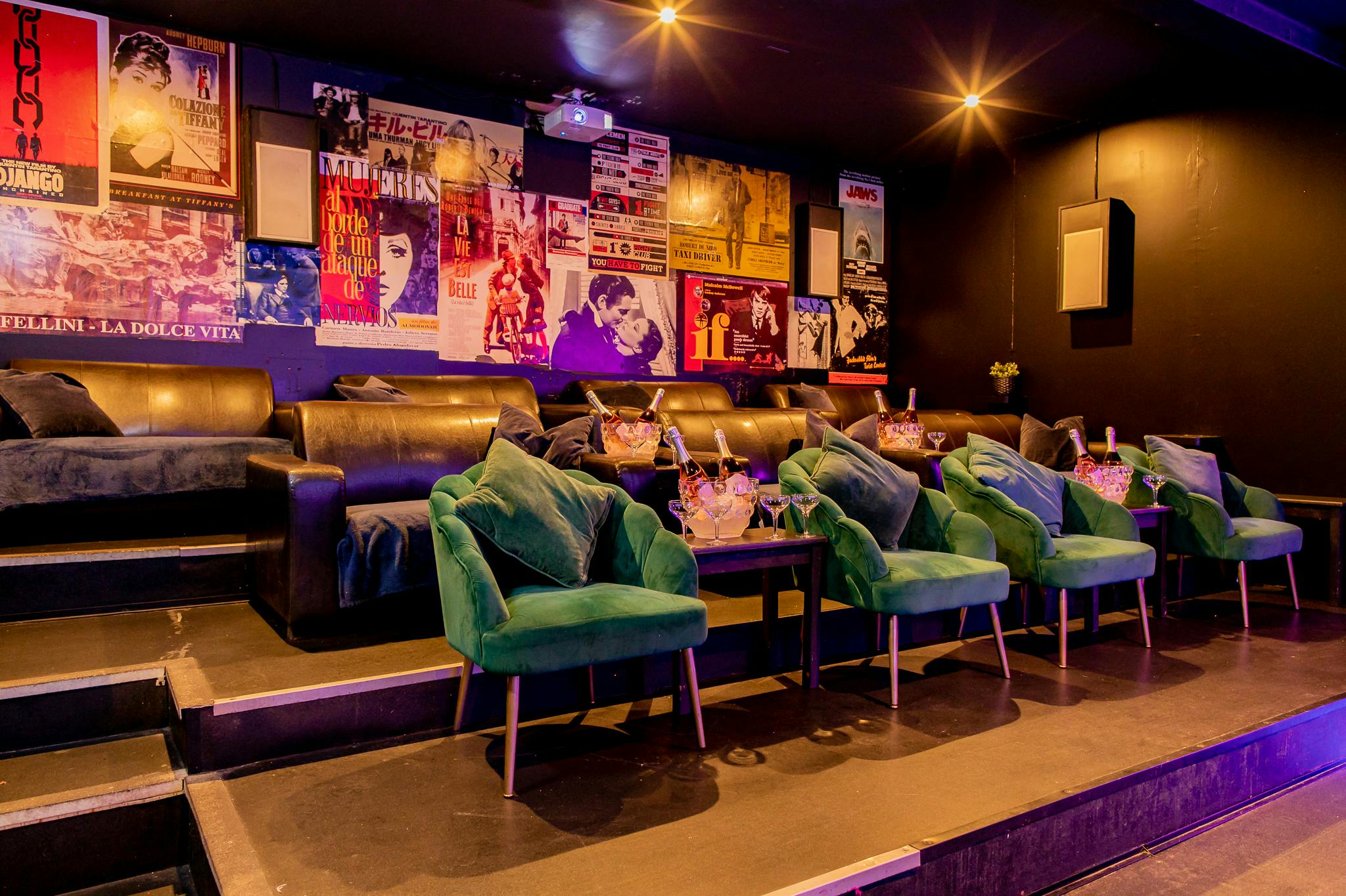 Stylish Cinema/Karaoke Suite with plush seating for intimate events and private screenings.