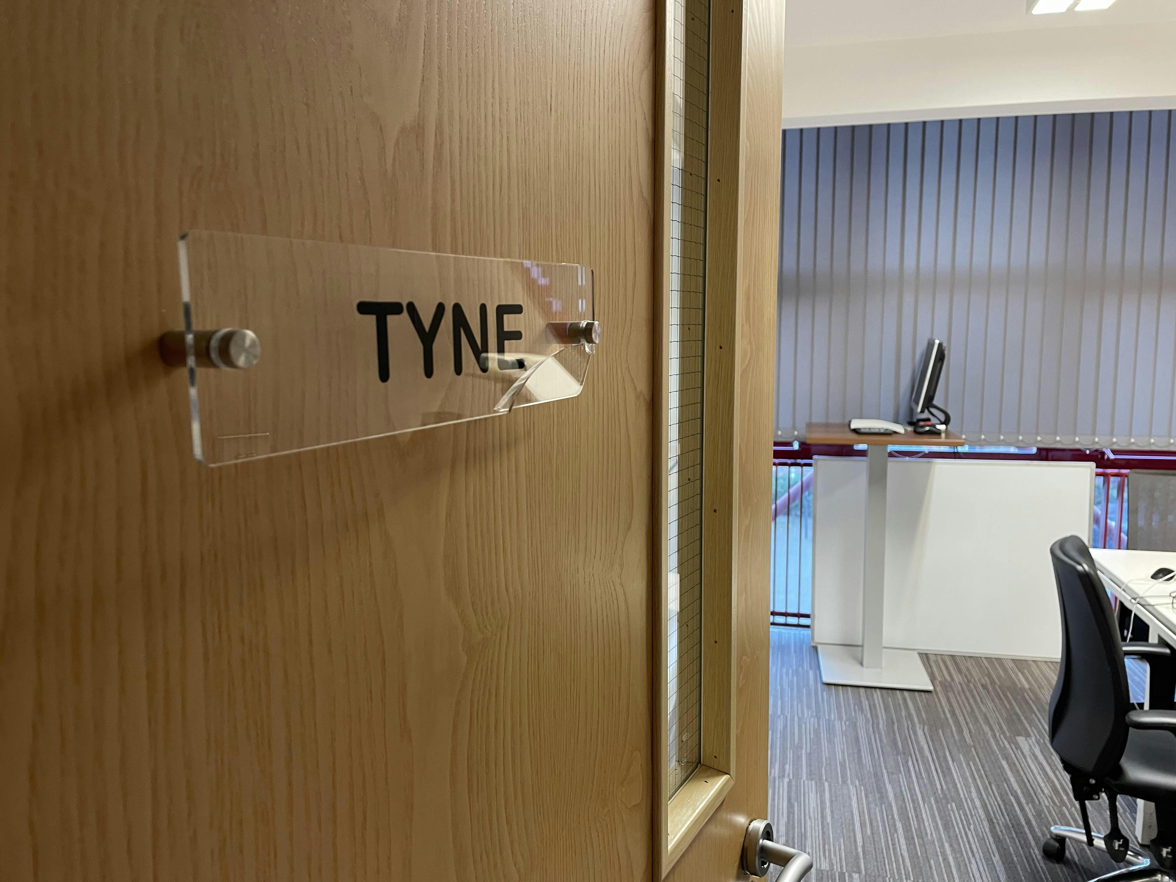 Modern meeting room "TYNE" in Skylines Village for corporate events and team discussions.