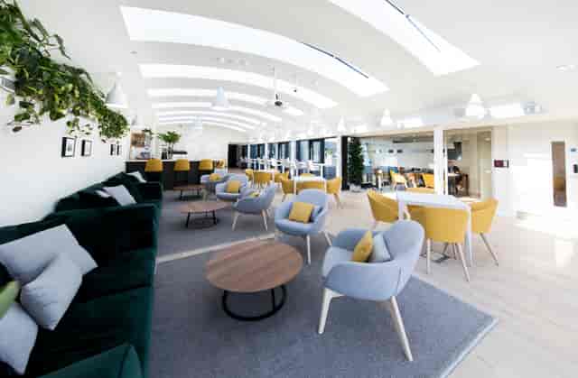 Gallery on 5 meeting space with lounge seating for networking and strategy events.
