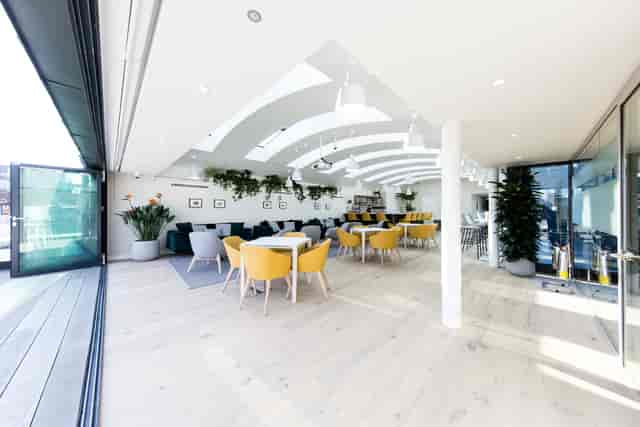 Gallery on 5 event space with natural light, perfect for networking and informal meetings.
