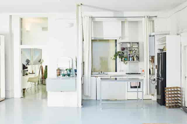 Bright minimalist studio venue for intimate gatherings and creative workshops.