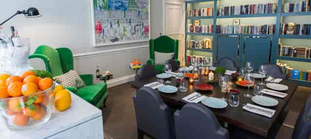 Intimate dining setup in The Ampersand Hotel's Library for private events and meetings.
