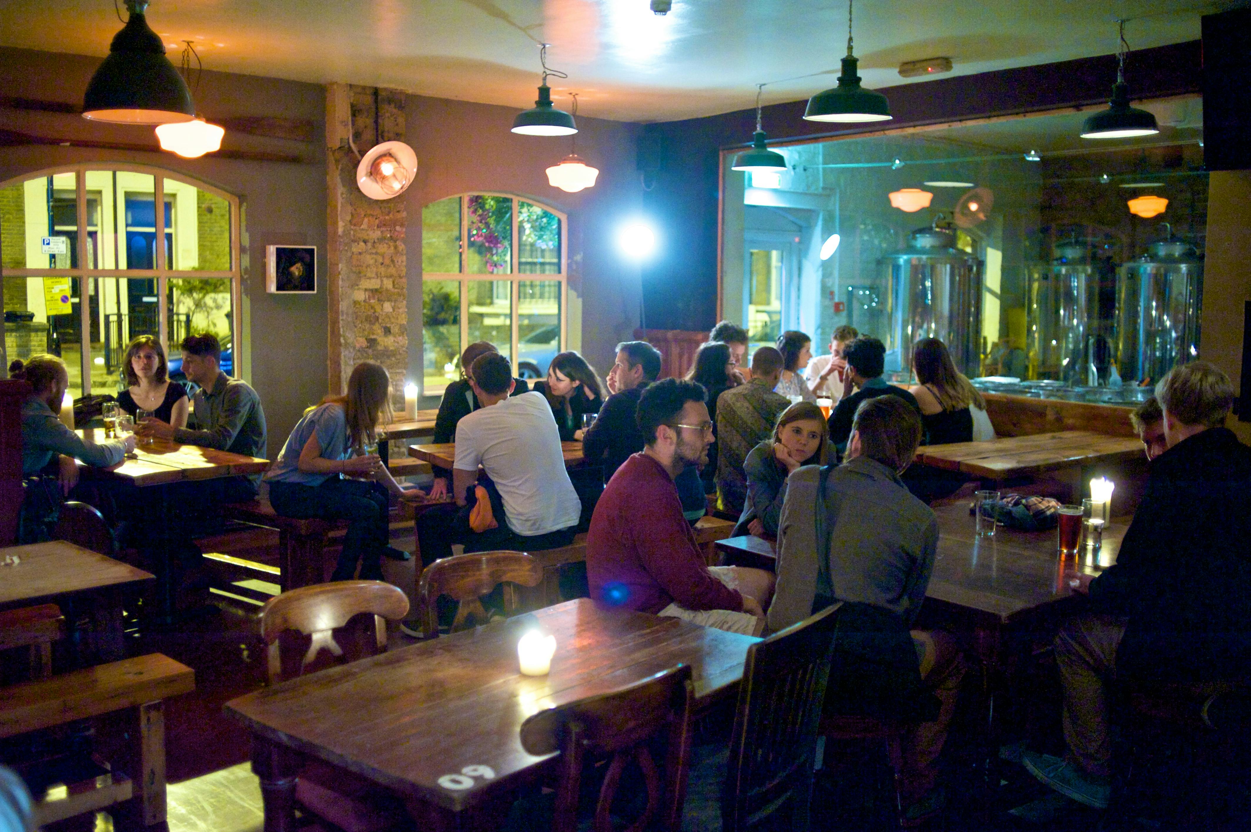 Microbrewery at Peoples Park Tavern, warm lighting, ideal for networking events and gatherings.