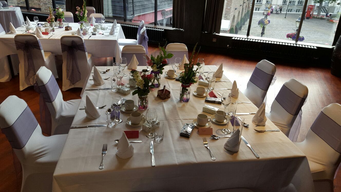 Elegant dining setup in Dickens Inn for weddings and corporate events.