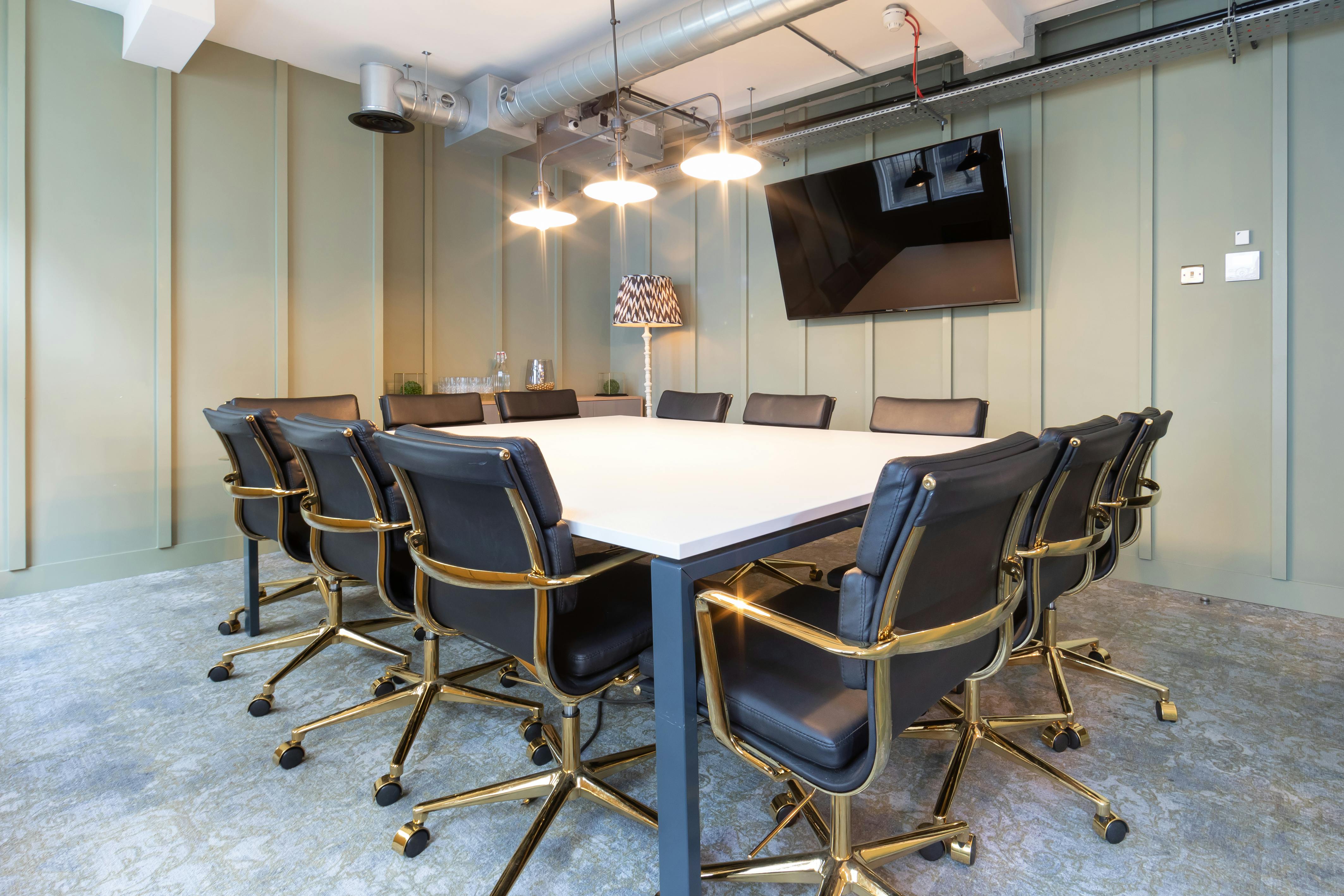 Modern conference room with large table, ideal for corporate meetings and presentations.