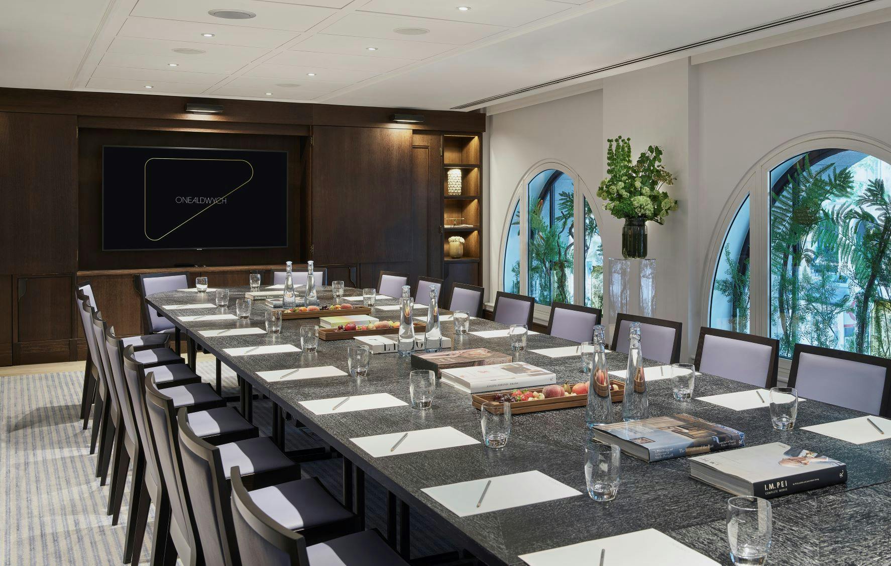 Sophisticated meeting room at One Aldwych with elegant table, ideal for corporate events.