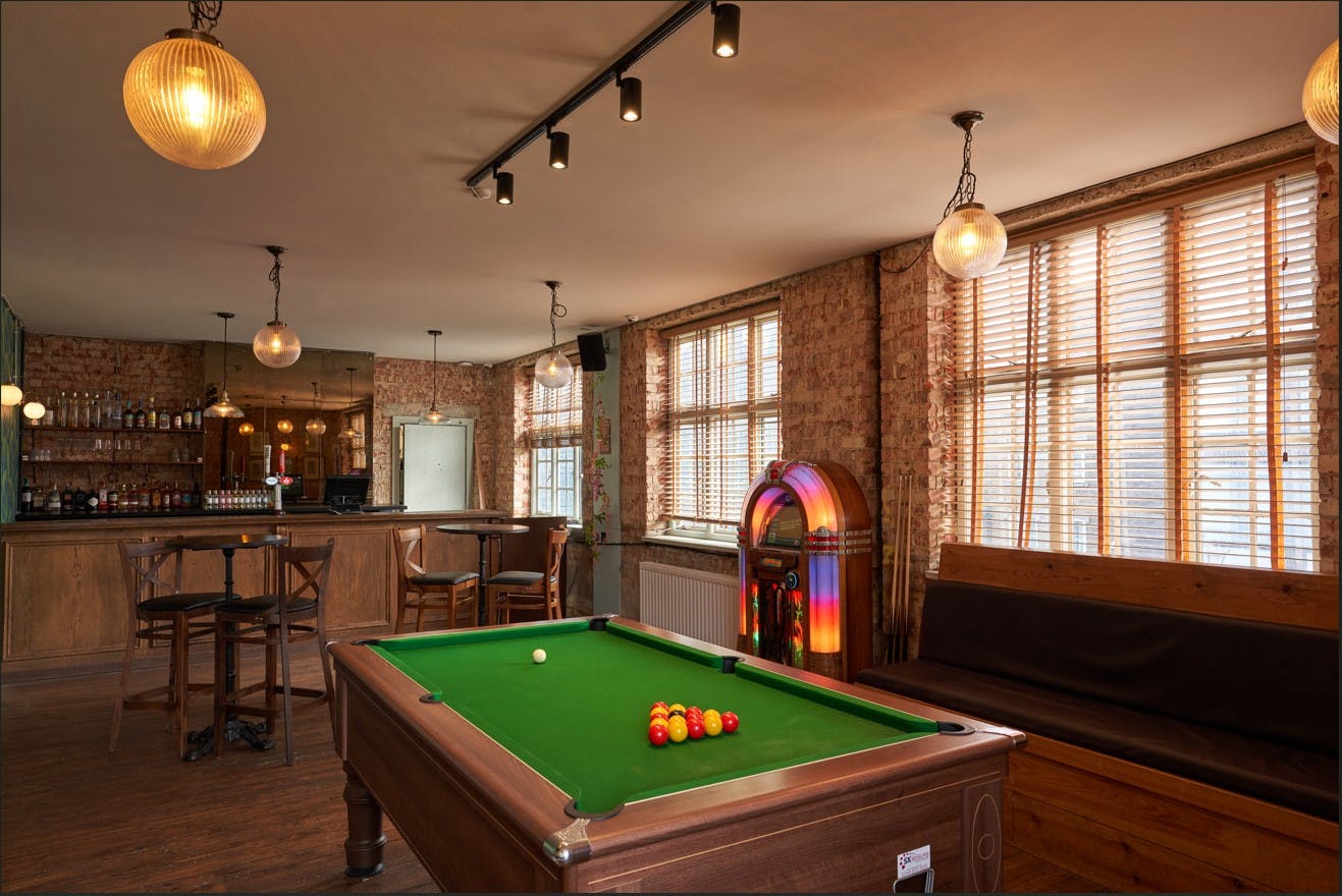 Tudor Room at The Prince: stylish venue with pool table for social events and networking.