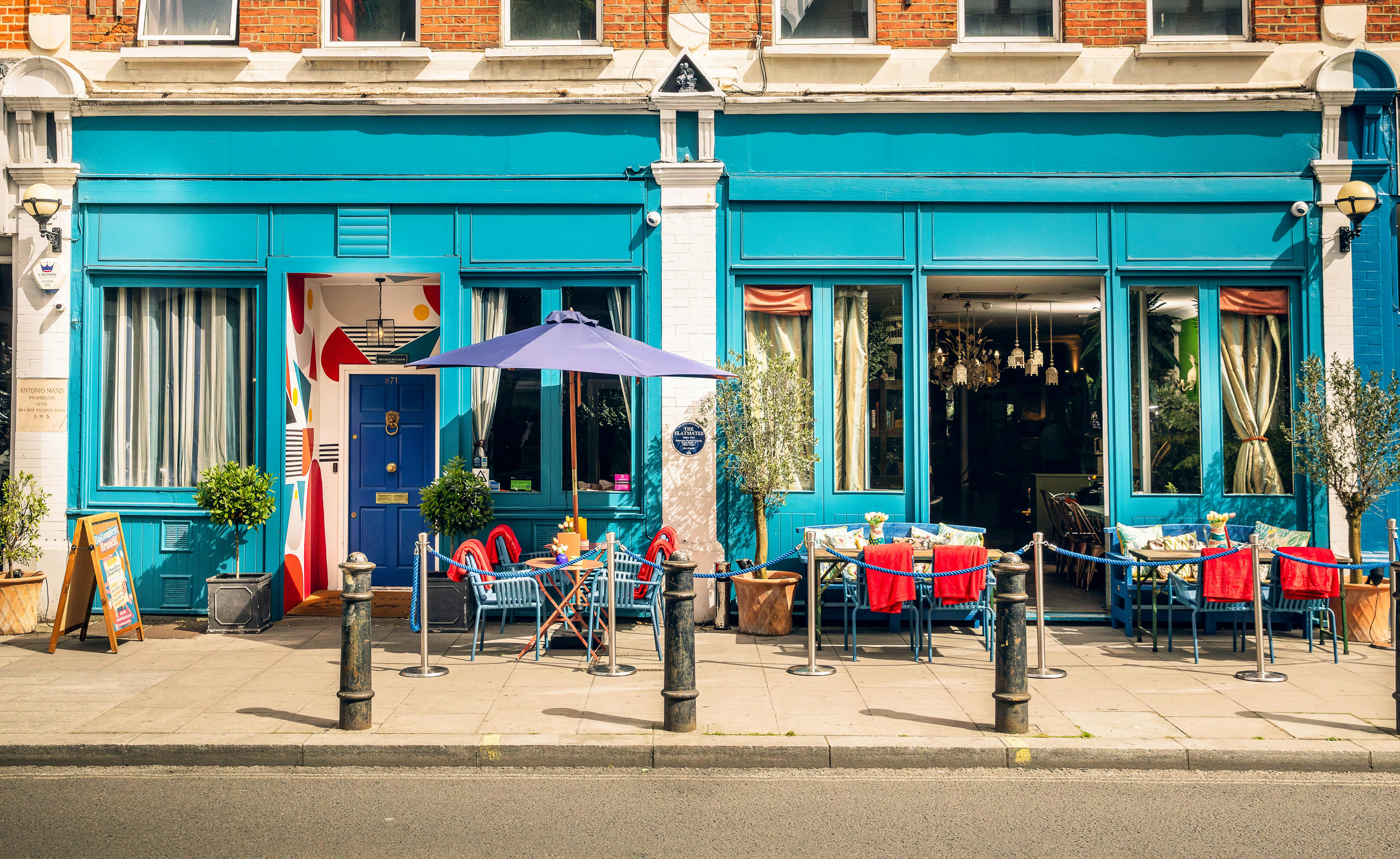 Vibrant outdoor seating at The Living Room, ideal for networking events and gatherings.