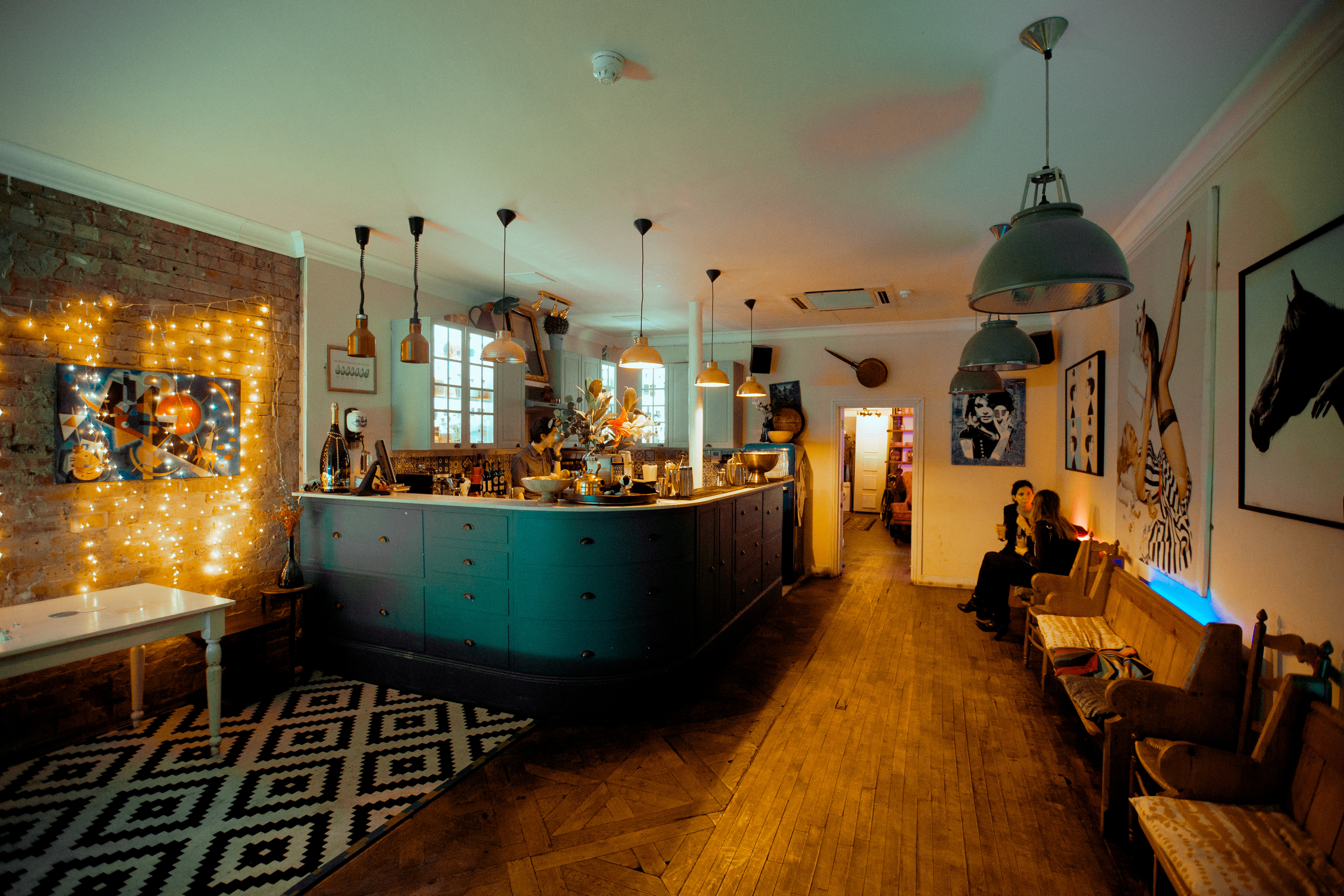 Stylish kitchen venue with warm lighting for intimate gatherings and networking events.