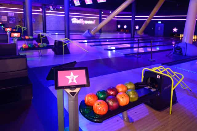 Vibrant bowling alley at Hollywood Bowl O2, ideal for corporate events and team-building.