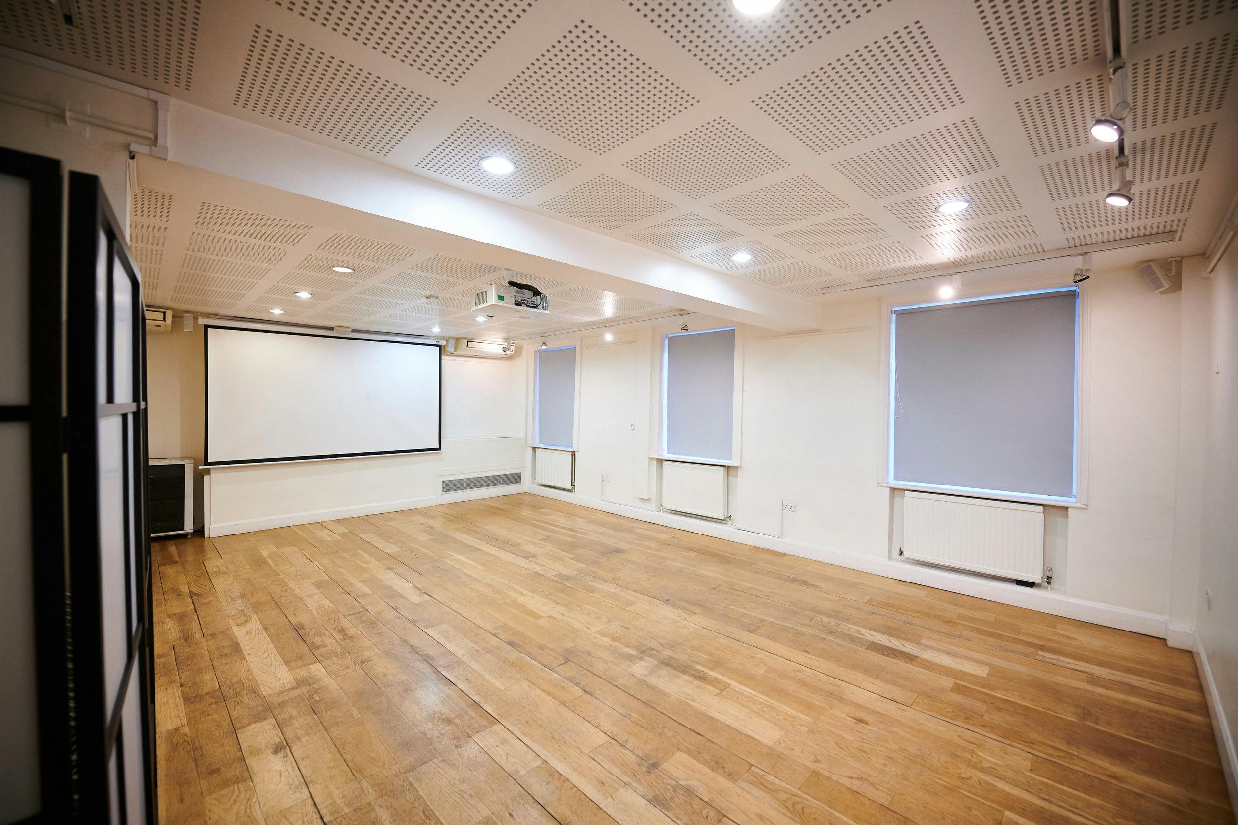 Screening Room at Pushkin House, bright minimalist space for workshops and conferences.