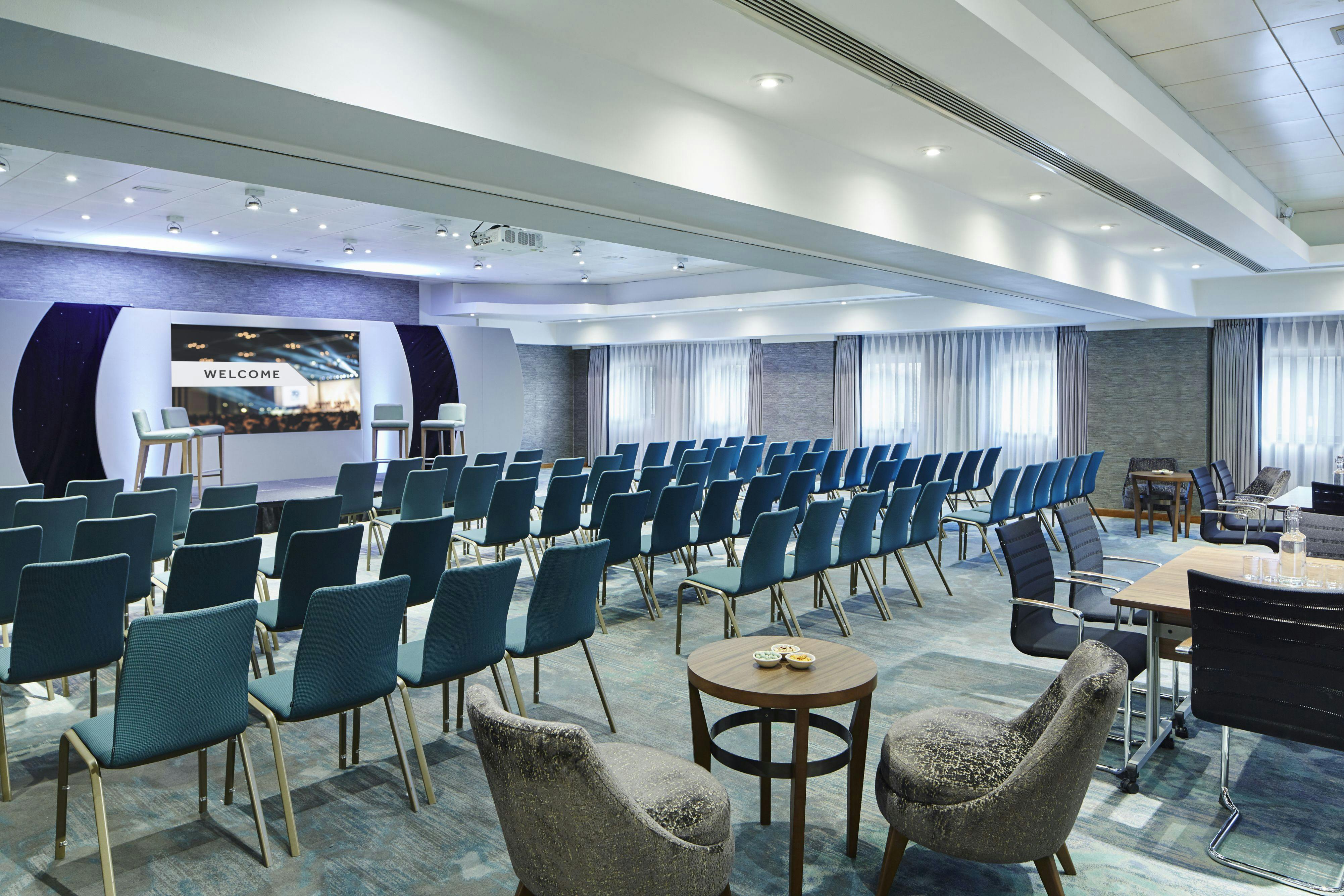 Cheshire Suite at Delta Hotels: modern meeting space for presentations and networking.