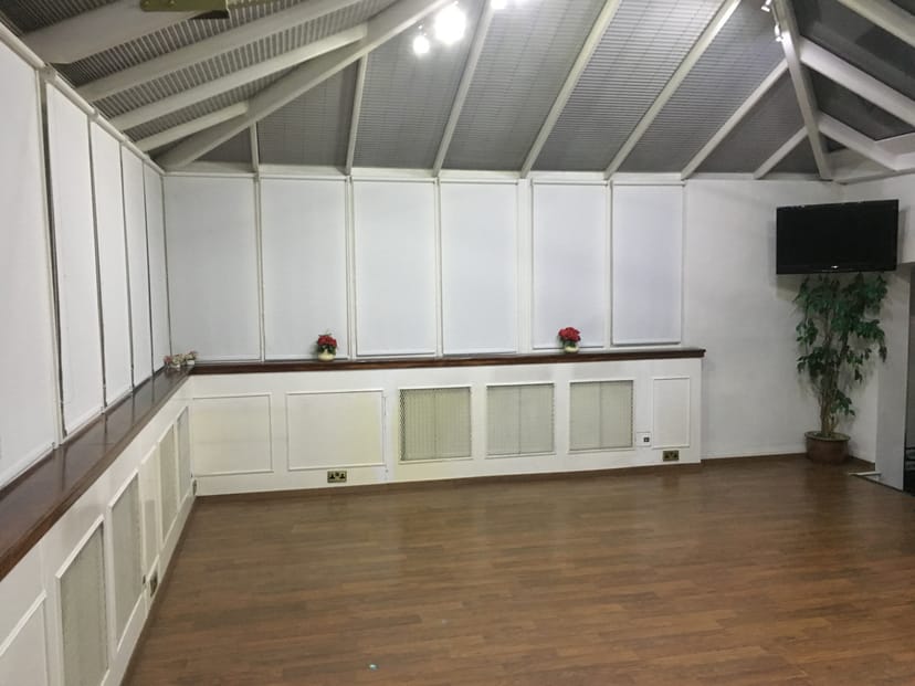Meeting Room in Space 88 with large windows, ideal for workshops and events.