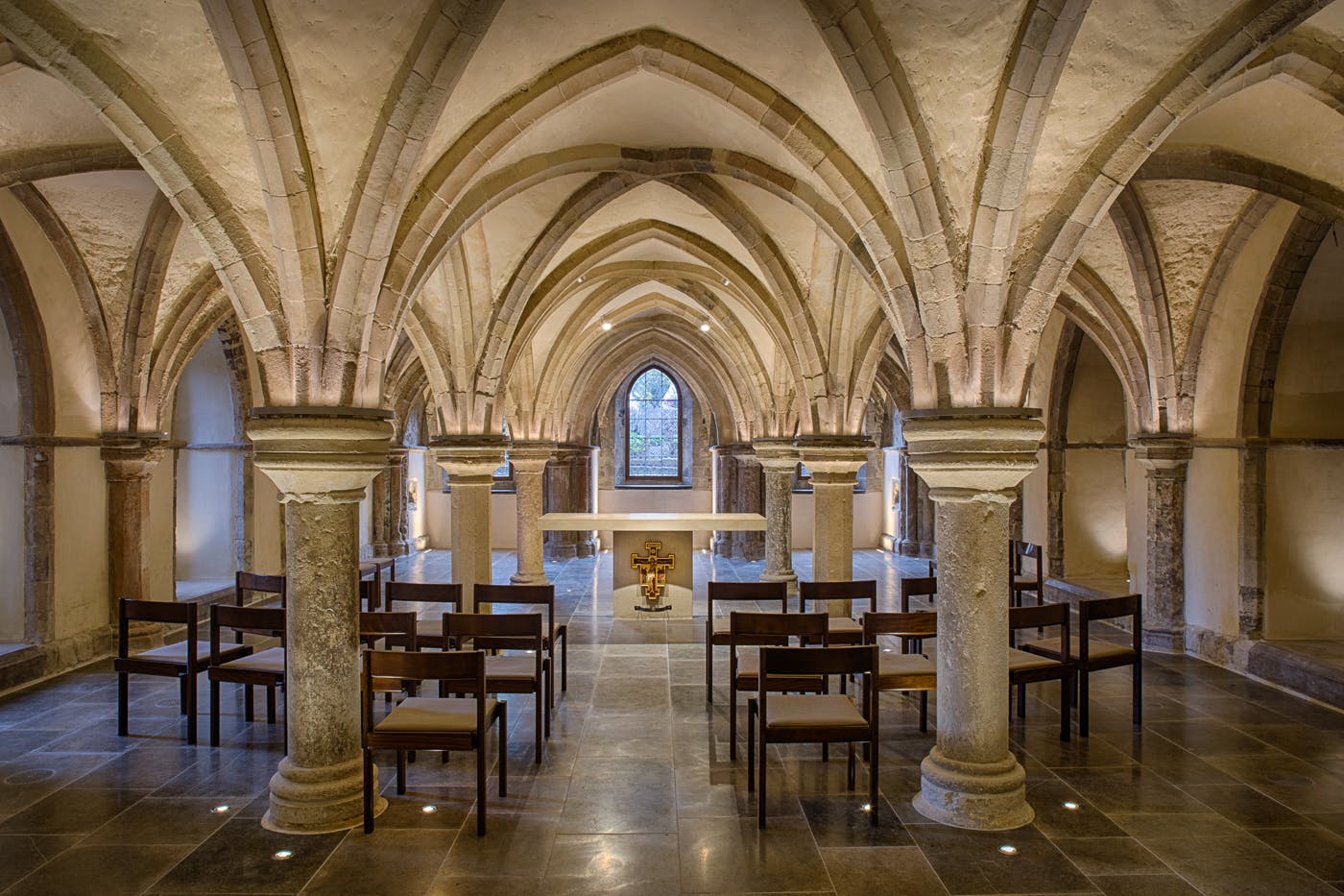 Crypt in Rochester Cathedral with vaulted ceilings, ideal for intimate events and ceremonies.