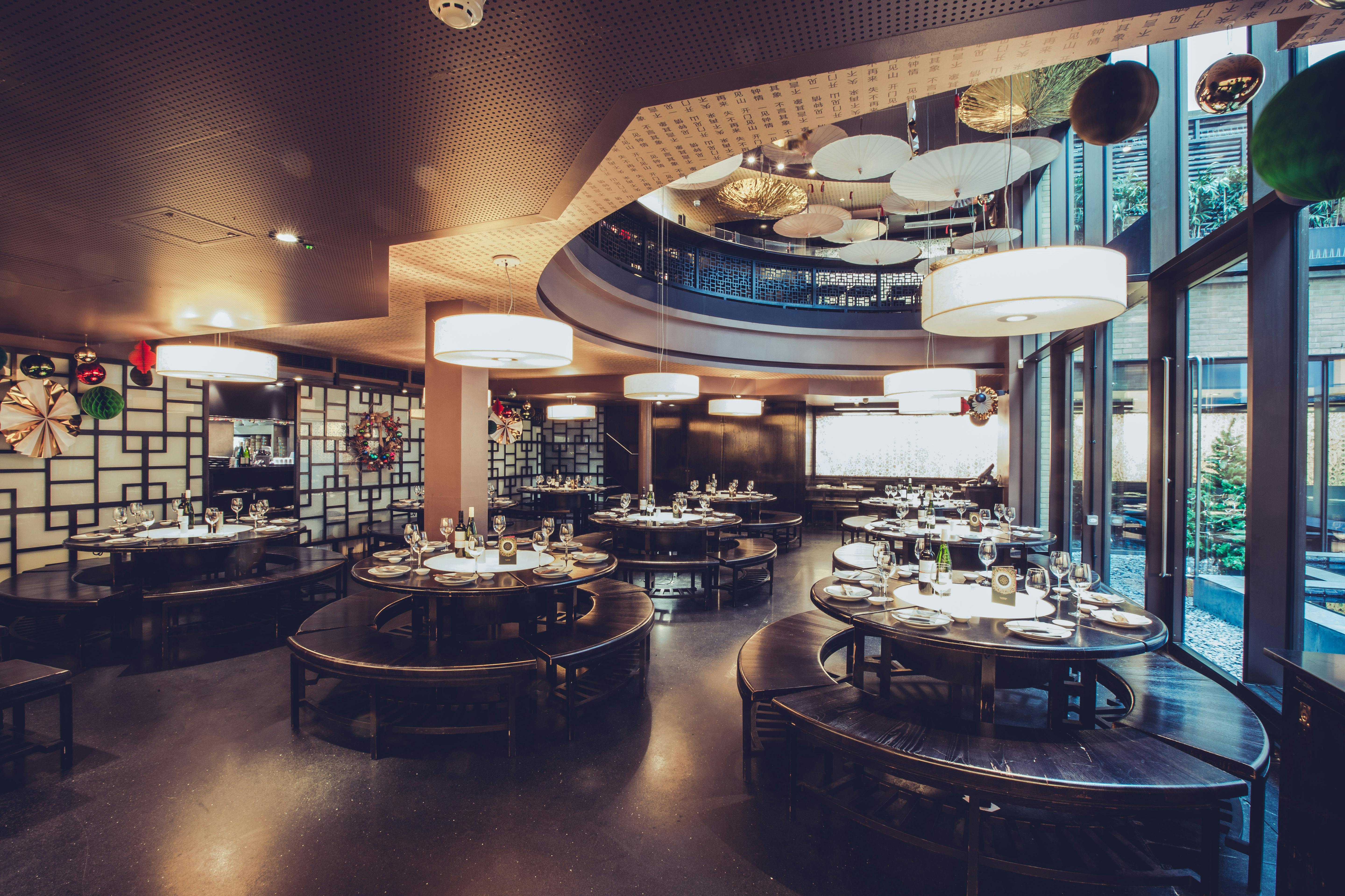 Stylish restaurant with circular tables for Chinese New Year parties in Soho.