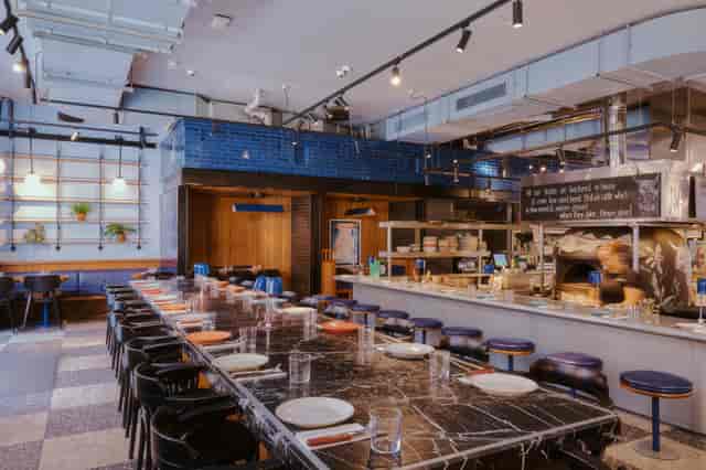 Temper Covent Garden open-kitchen venue for networking events and team dinners.