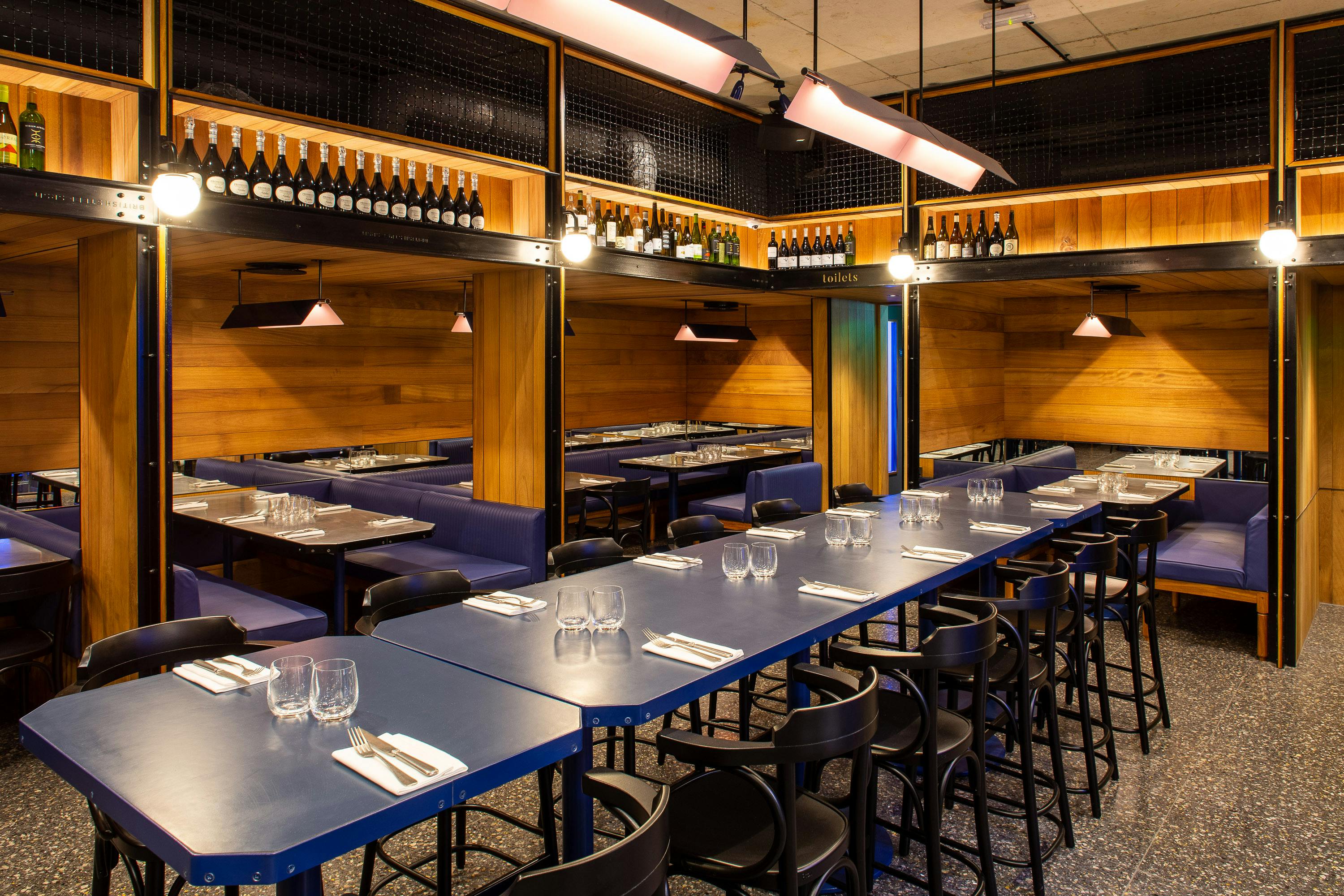 Modern dining space in Covent Garden, featuring cozy booths for events and gatherings.