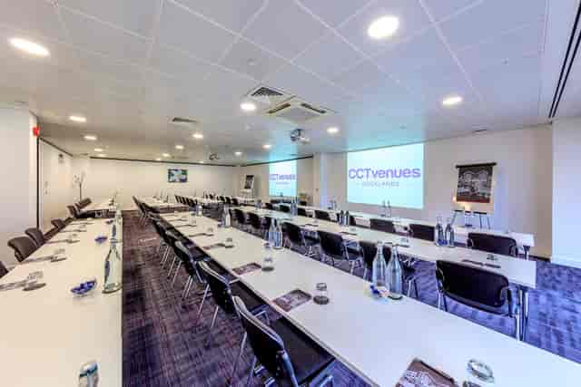 Jasmine Room classroom-style meeting space with AV setup for corporate training and seminars.