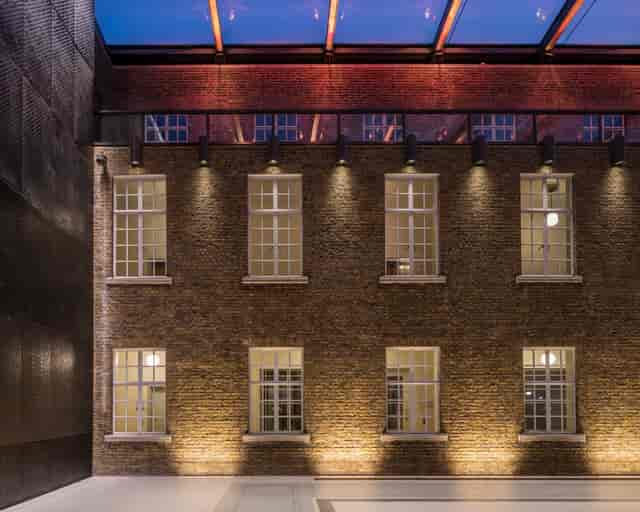 Atria in Hackney Town Hall: elegant brick venue with large windows for events.