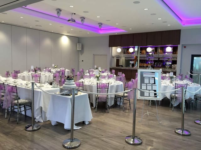 Garden Suite at Greenwoods Hotel, elegant dinner setup with white linens, ideal for events.
