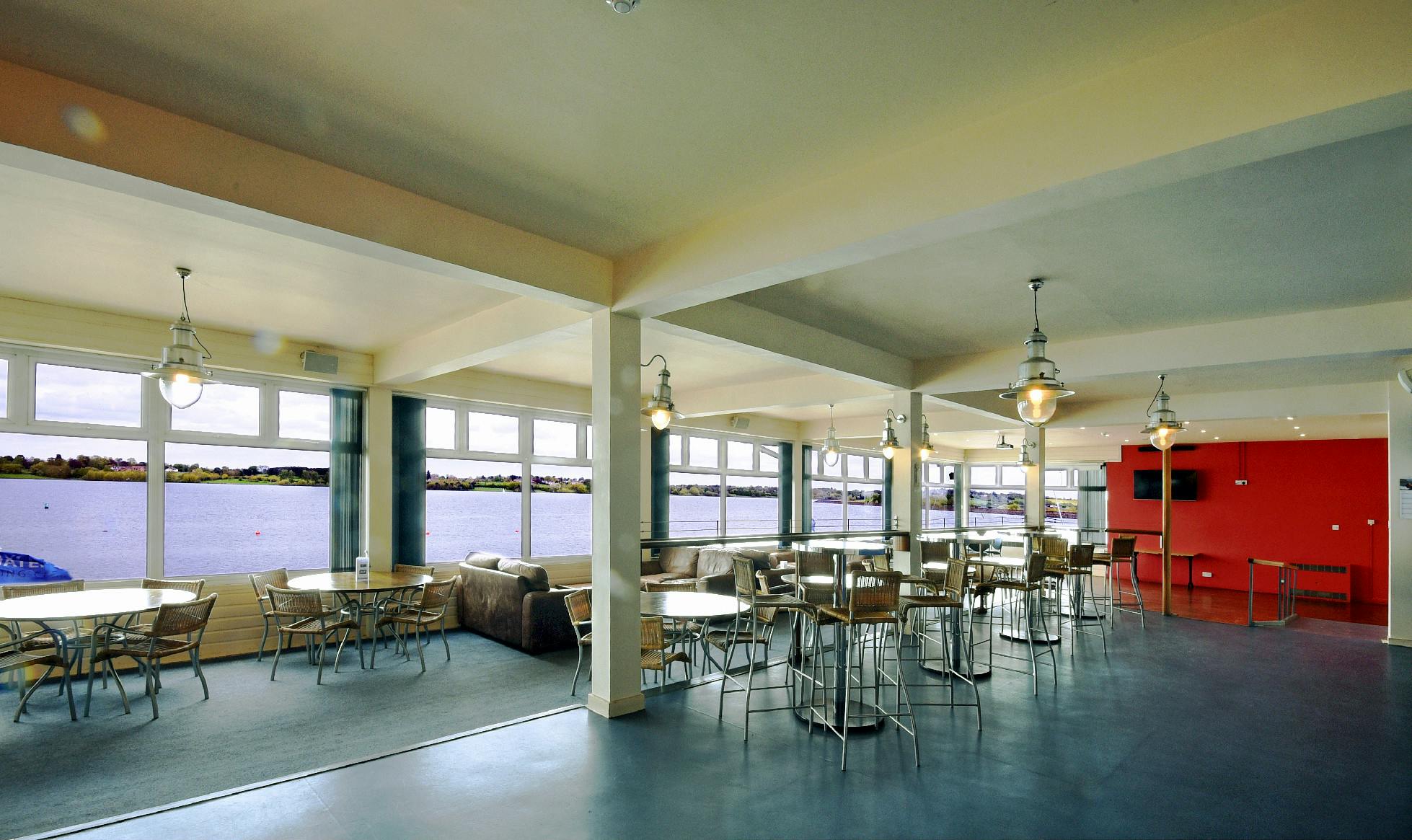 Draycote Lounge event space with large windows, ideal for gatherings and workshops.