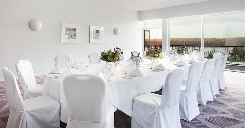Elegant meeting space at Crowne Plaza Marlow with polished table setup for corporate events.