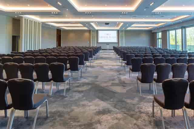 Winterlake Suite conference room with chairs and presentation screen, ideal for events.