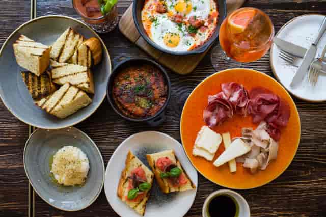 Gourmet dishes in The Wine Room, Ampersand Hotel for corporate brunch networking event.