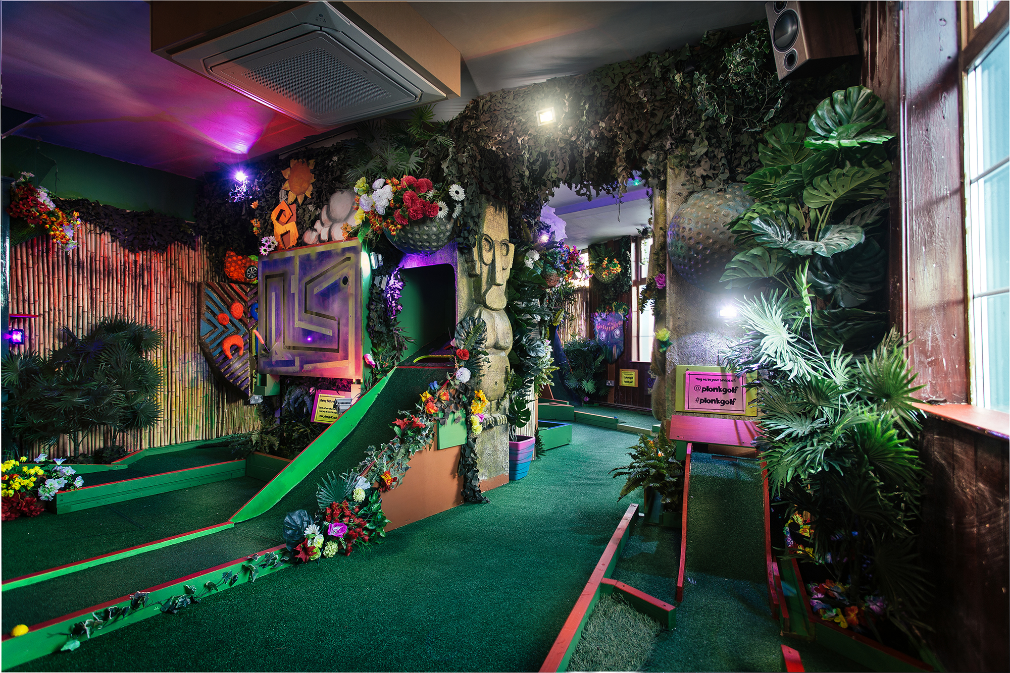 Vibrant mini-golf venue in Islington, ideal for corporate events and team building. - Banner