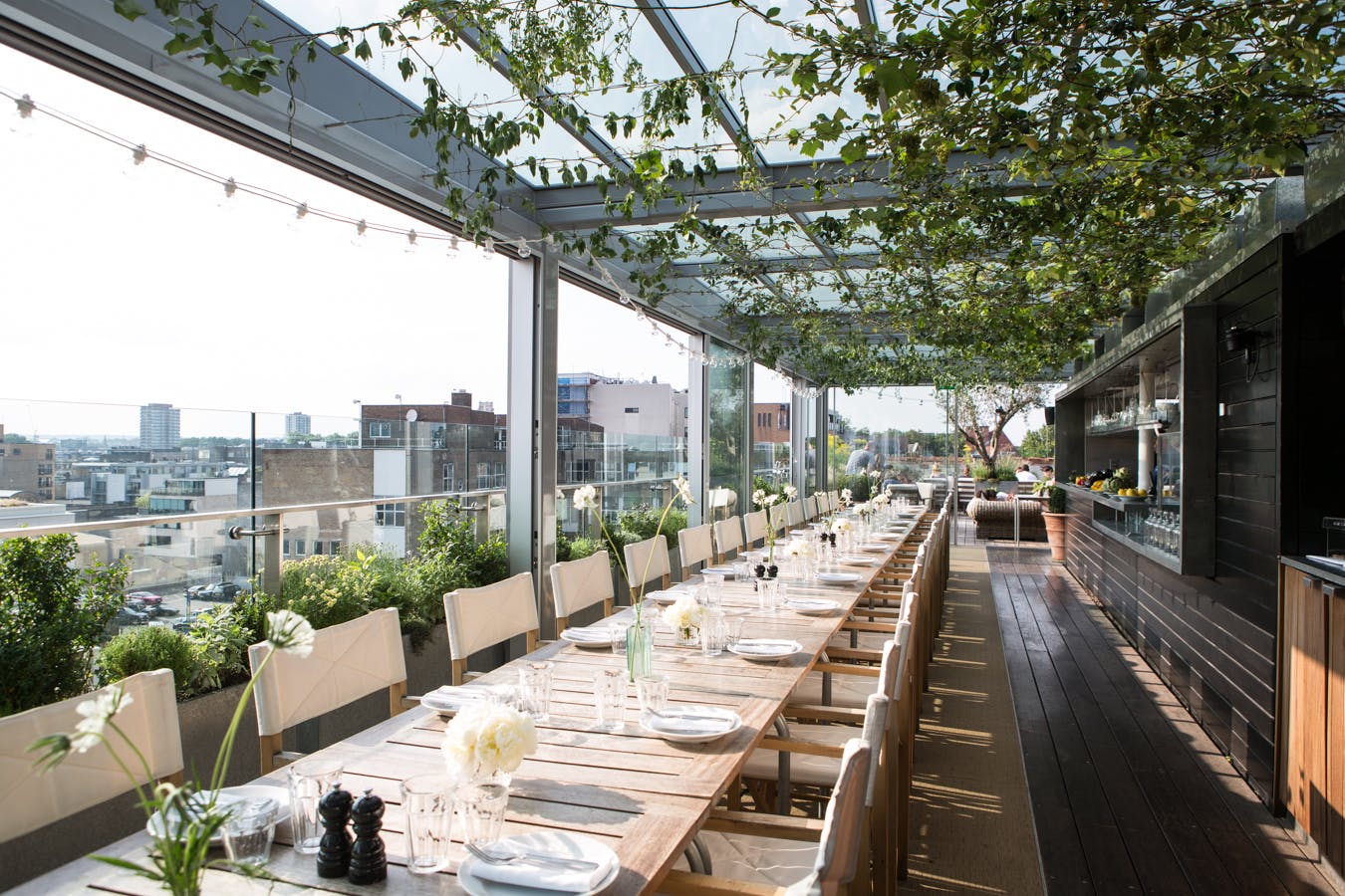 Boundary Rooftop venue in London with communal dining and city views for upscale events.