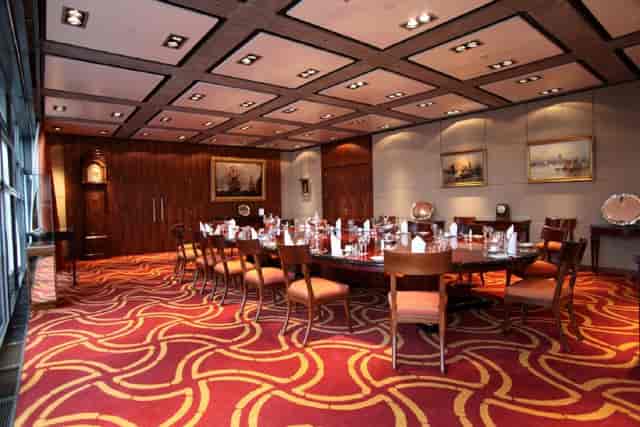 Sophisticated Boston Room at Lloyd's with an oval table for executive meetings.