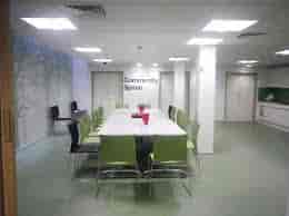 Boardroom-style community room at Church Street Library for workshops and meetings.