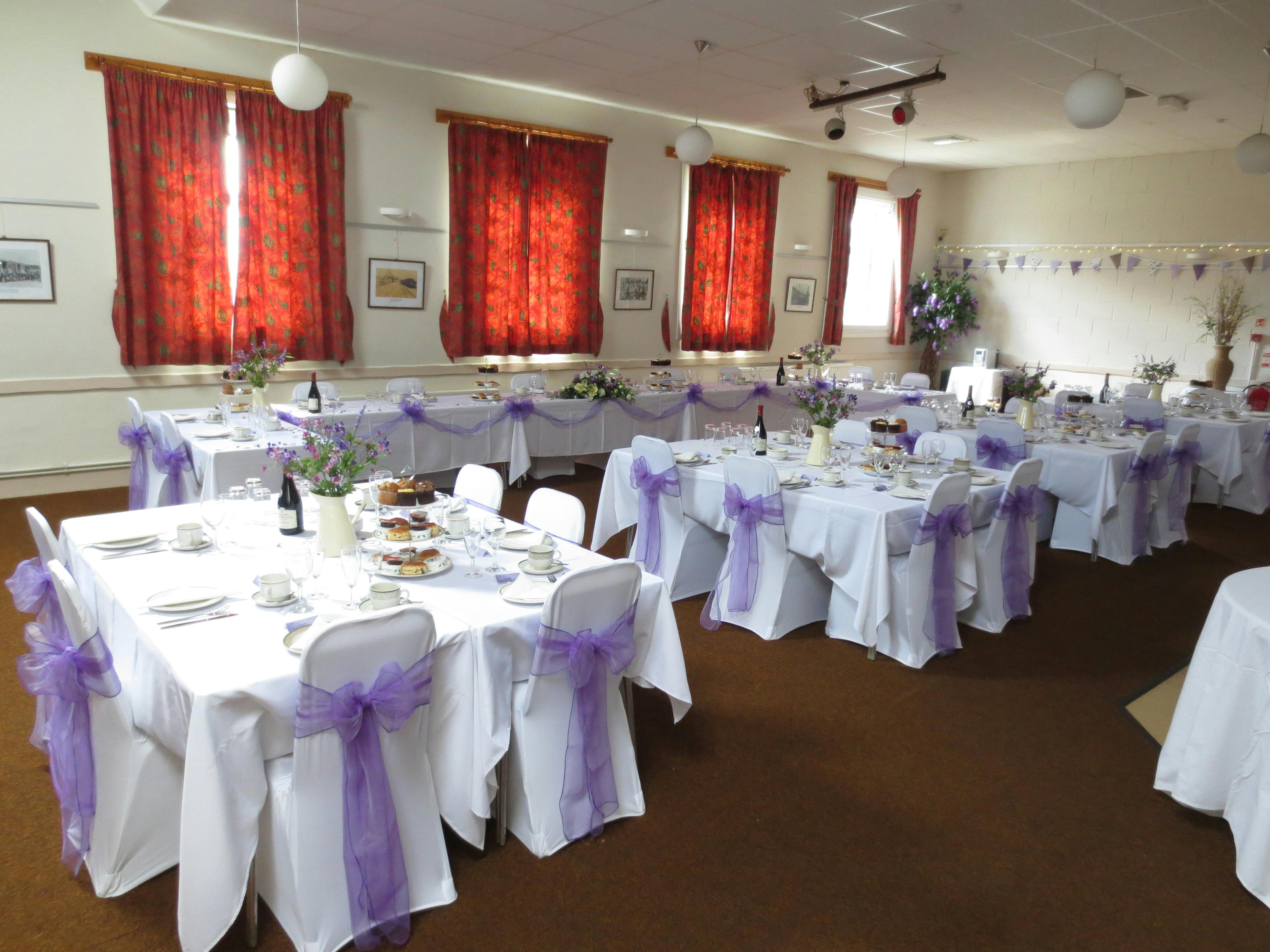 Elegant Woodford Suite with white linens, ideal for weddings and formal gatherings.