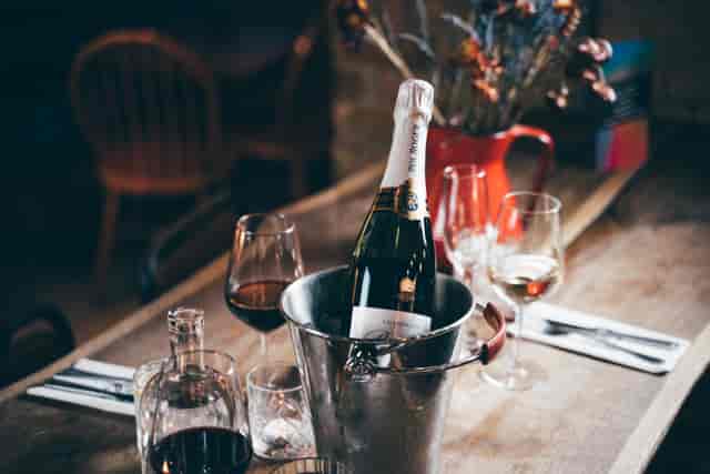 Elegant table setting with champagne in Oslo Hackney for upscale events and gatherings.