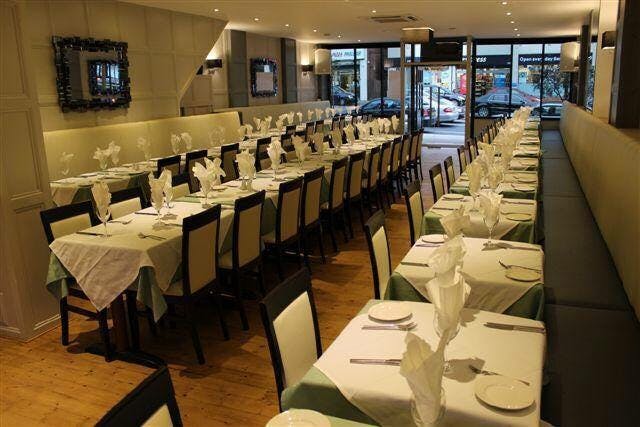 Whole Venue at Orama Restaurant with elegant dining setup for events and meetings.