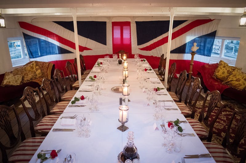 Elegant dining table at The Commissioner's House, perfect for British-themed events.