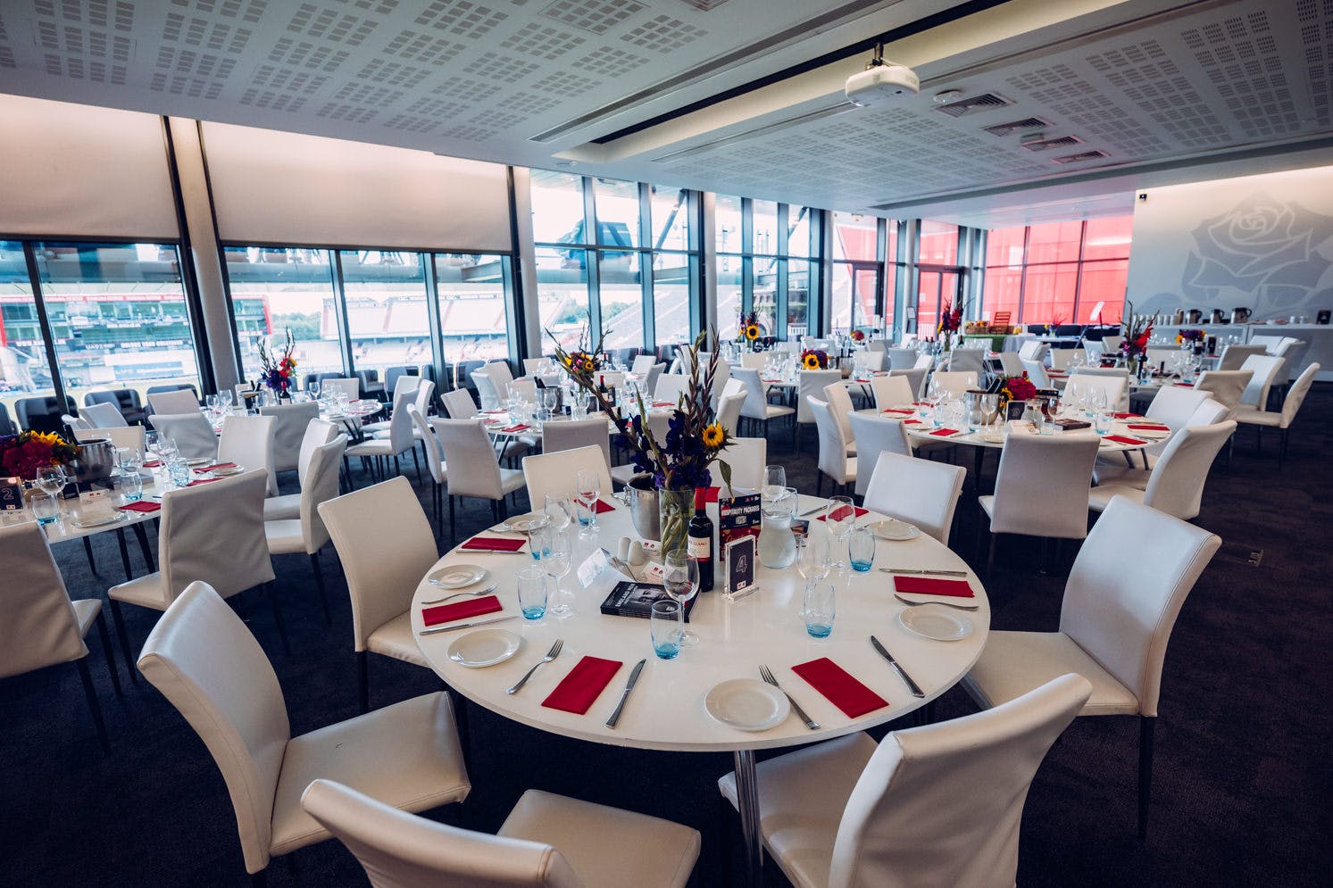 Elegant dining setup in 1864 Suite, Emirates Old Trafford for corporate events and weddings.