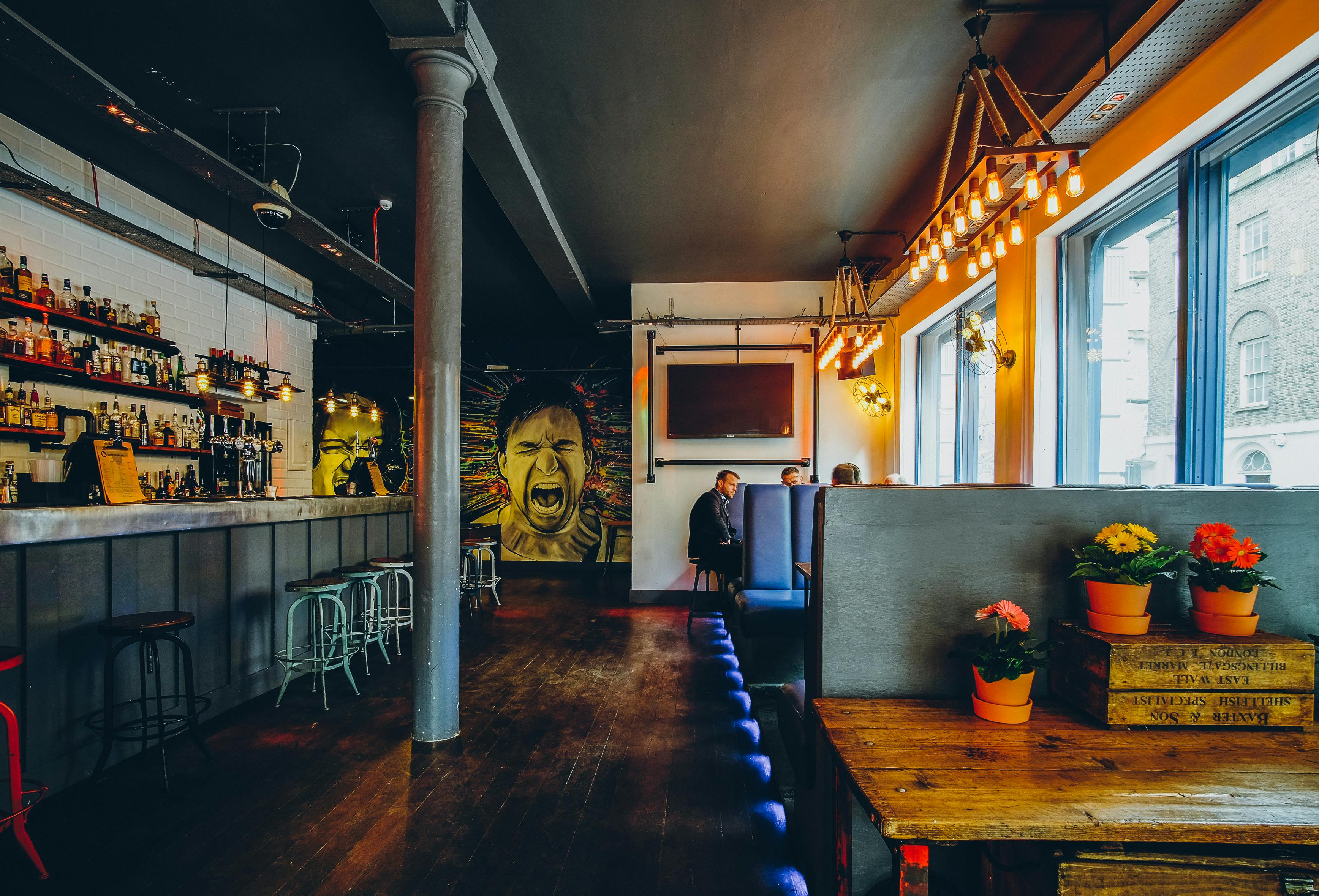 Vibrant Main Bar in Shoreditch with stylish seating for casual meetings and events.