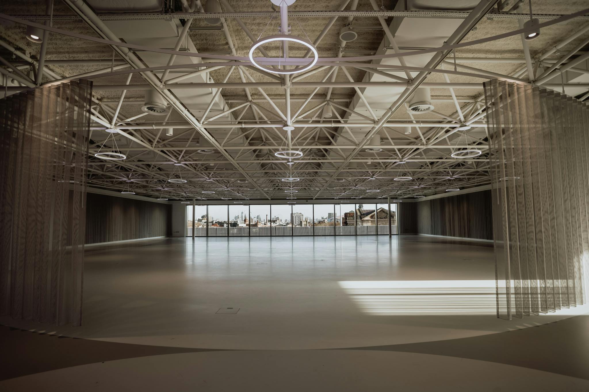 Illuminate event venue at The Science Museum with high ceilings, ideal for conferences.
