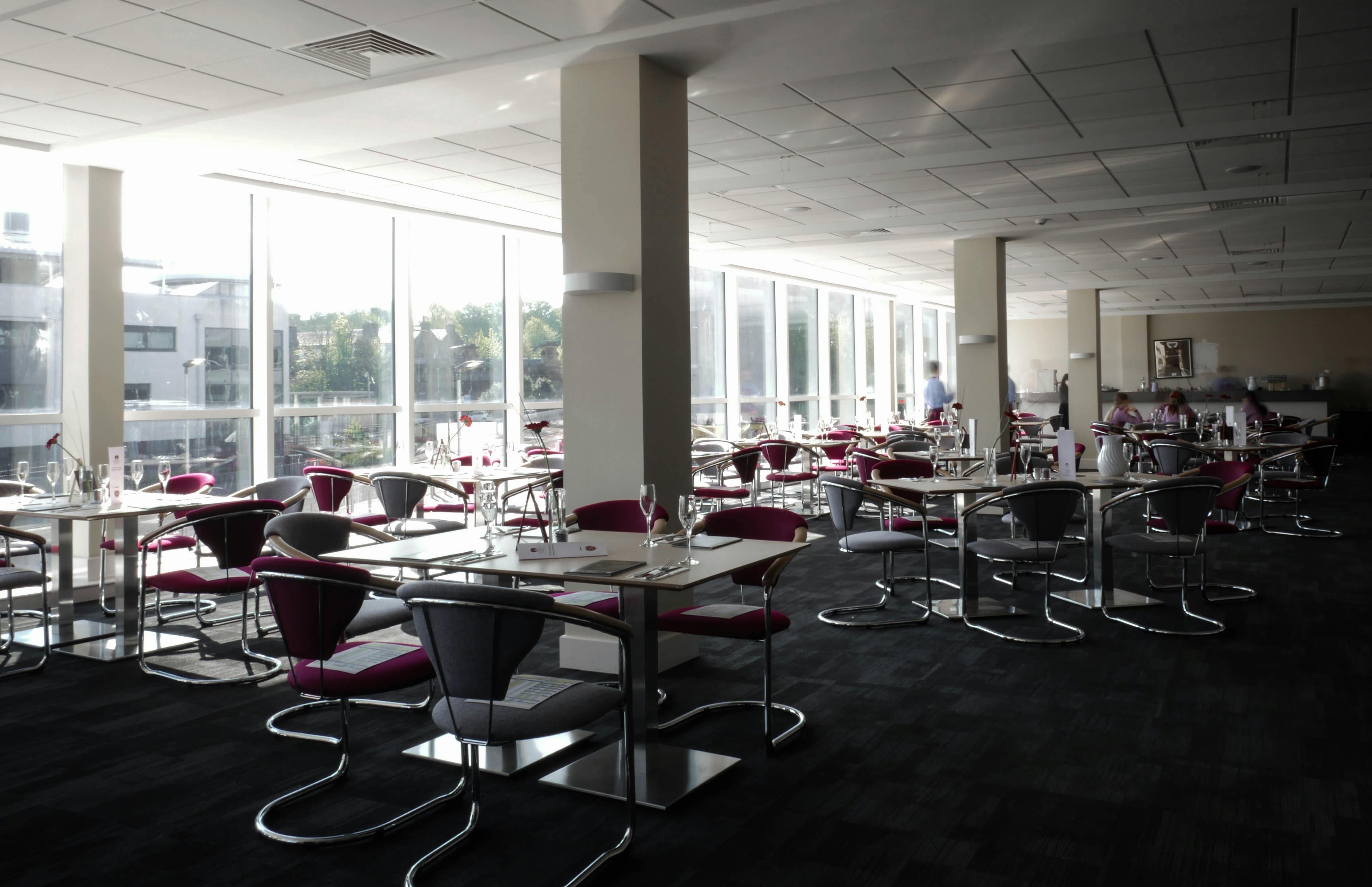 Modern Executive Lounge at Tynecastle Park, ideal for events and meetings with natural light.