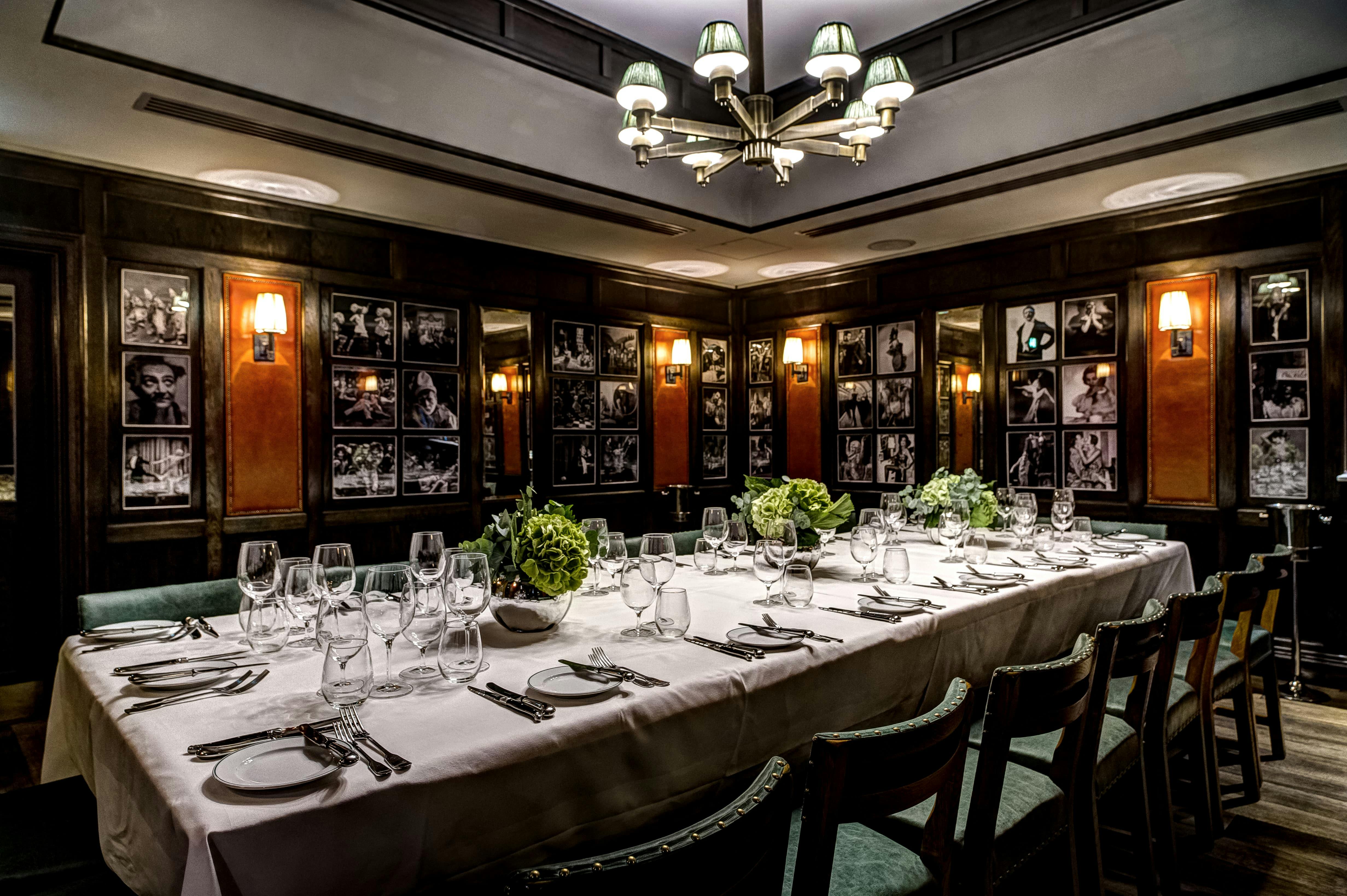 Elegant dining room at The Ivy Market Grill, perfect for corporate dinners and gatherings.