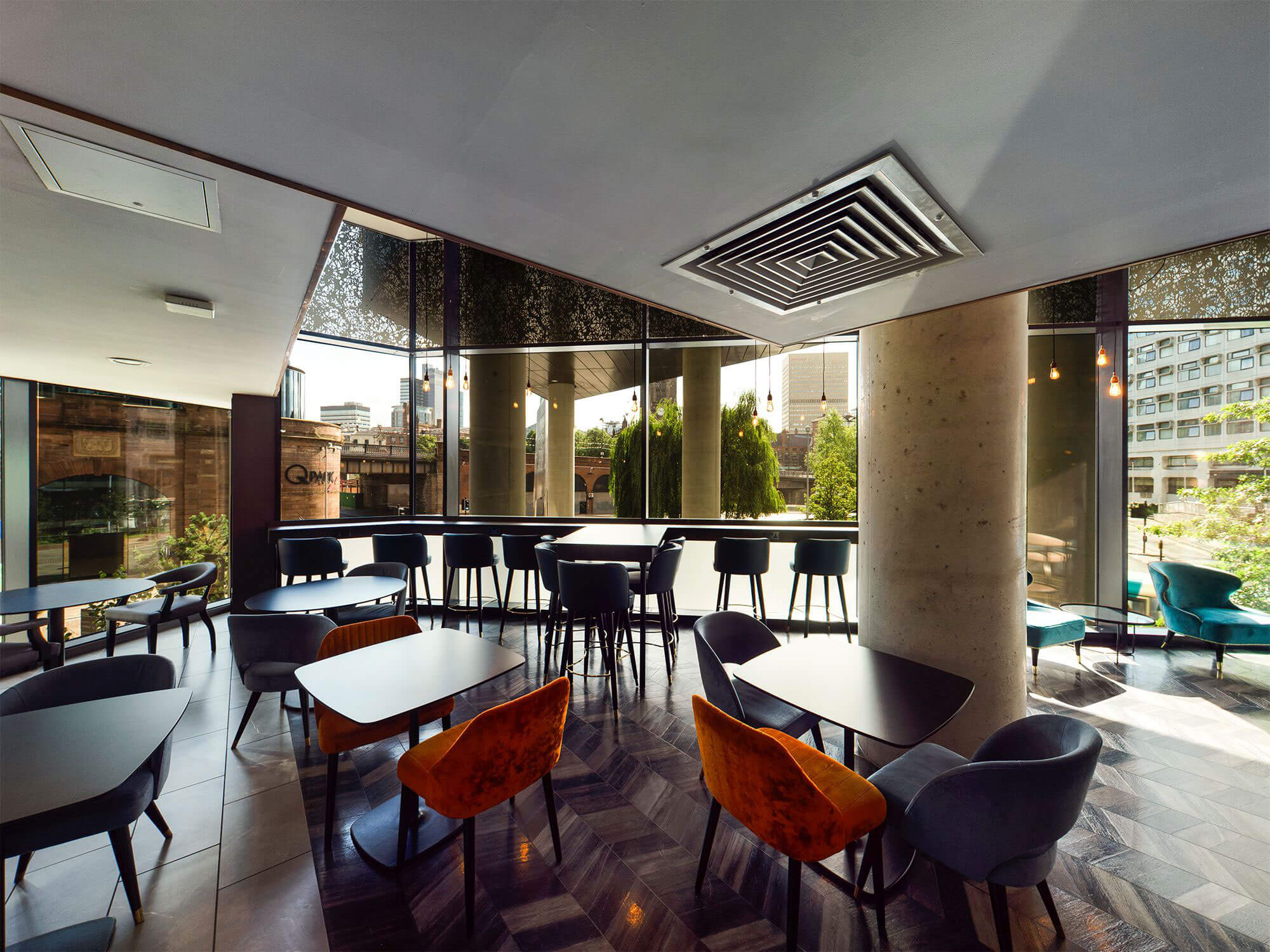 Modern Embankment Lounge with large windows, ideal for networking events and meetings. - Banner