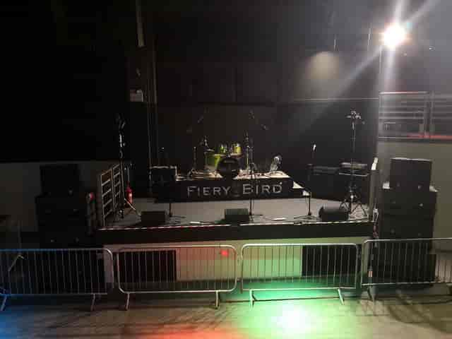Fiery Bird live music stage with AV setup, perfect for intimate concerts and corporate events.