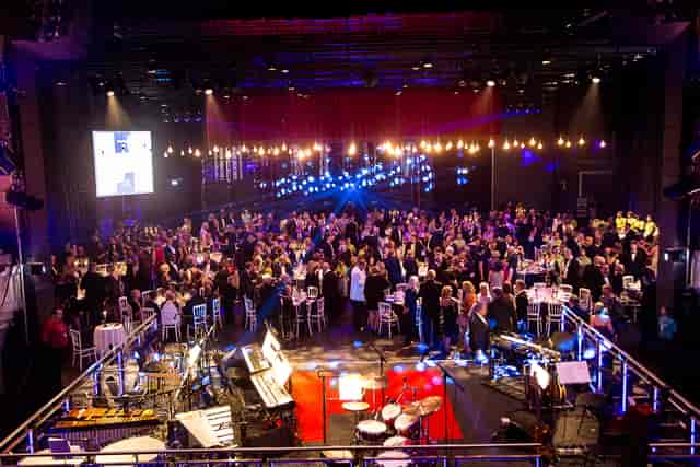 Birmingham Hippodrome auditorium set for a vibrant networking event with elegant tables.