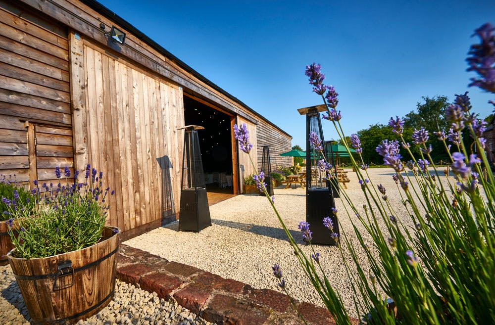 Stock Farm Barn: rustic venue with lavender, perfect for events and gatherings.