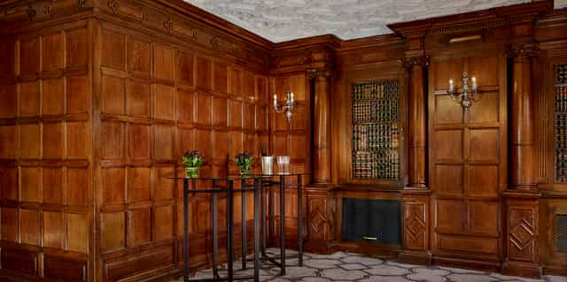 Sophisticated Oak Room at Sheraton Grand, ideal for upscale meetings and gatherings.