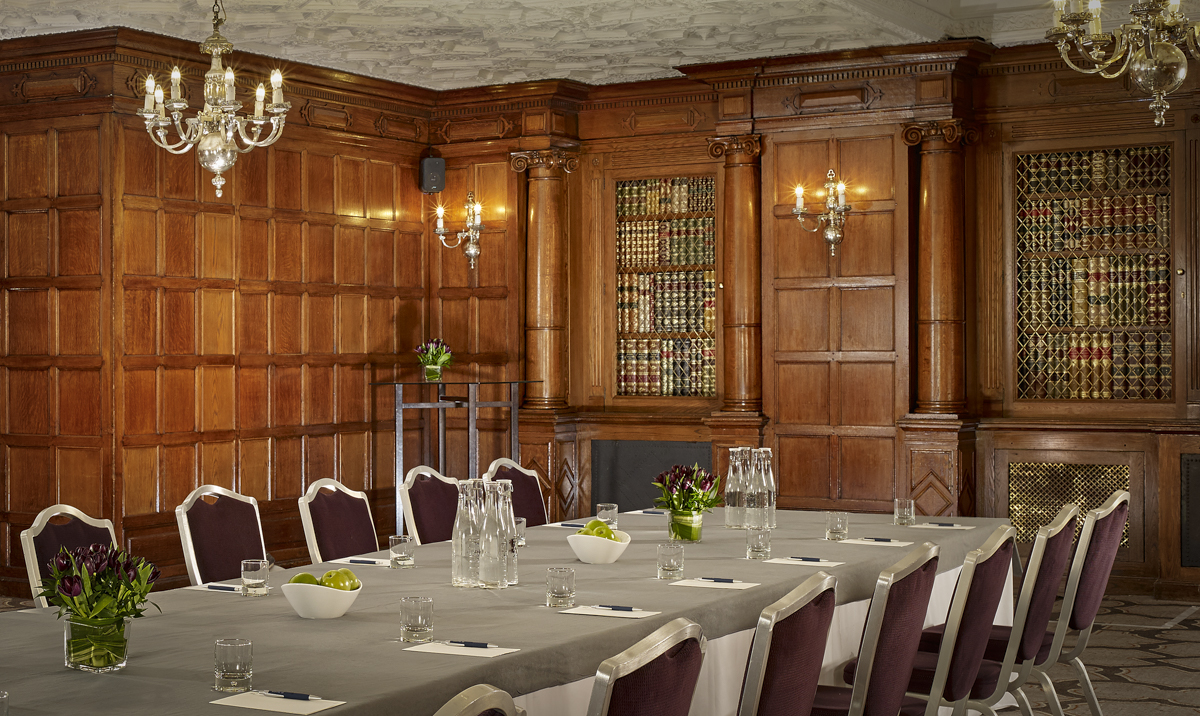 Elegant Oak Room at Sheraton Grand London for corporate meetings and workshops.