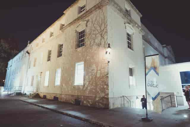 Lower Deck venue exterior at night, ideal for events with inviting atmosphere.