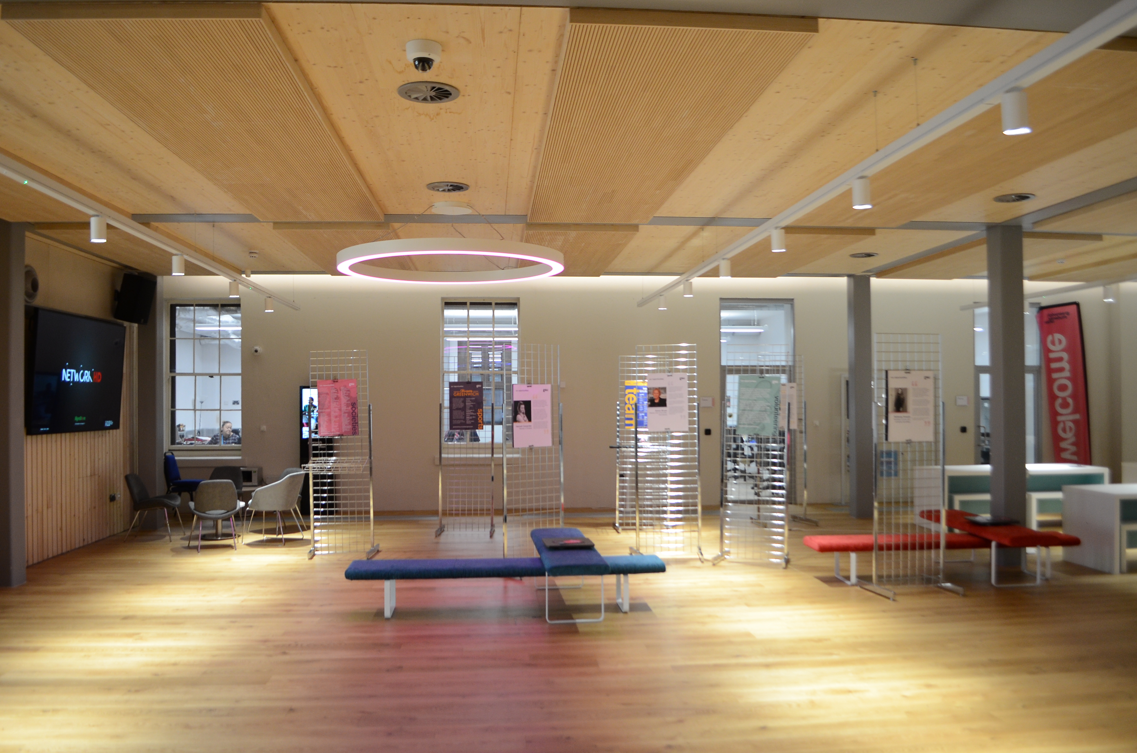 Modern event space in Dreadnought with sleek wooden flooring, ideal for exhibitions and workshops. - Banner
